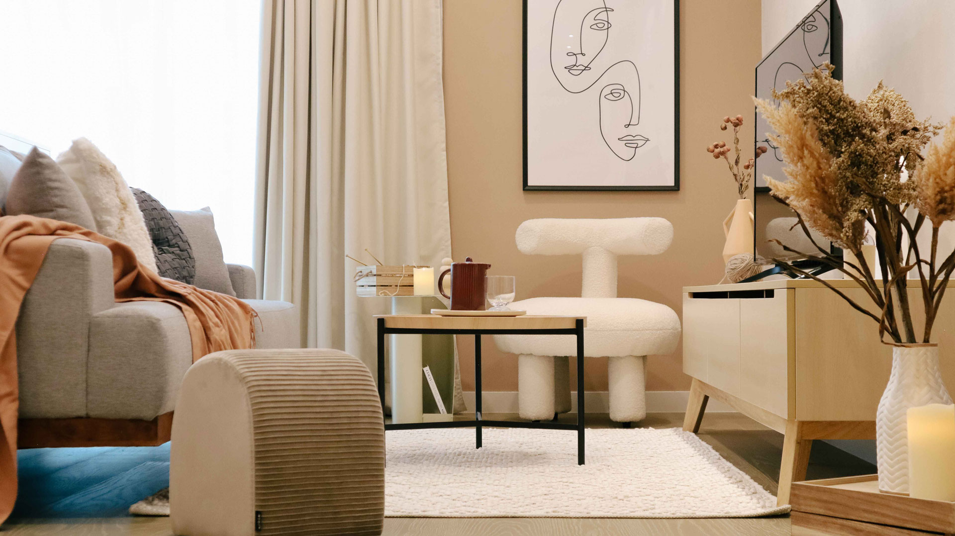 Living room designed with our Makeover Guys theme featuring the coffee table, sofa and TV console.